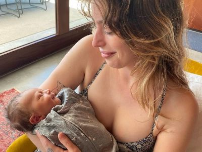 Clara Mathilde McGregor is holding Laurie McGregor close to herself.